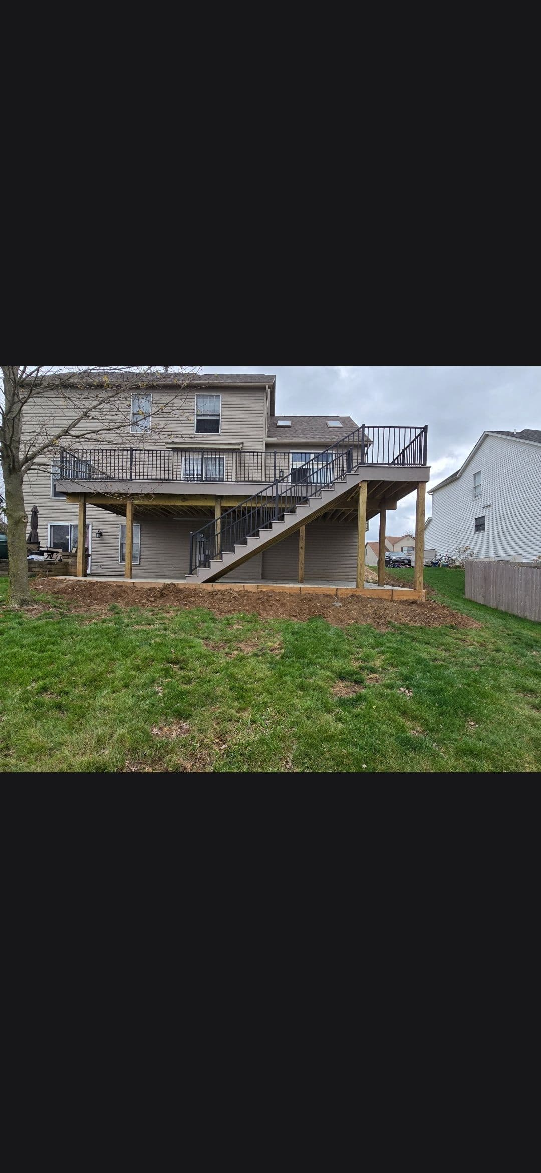 Retaining Wall, Planting Bed and Full Yard Restoration Completed