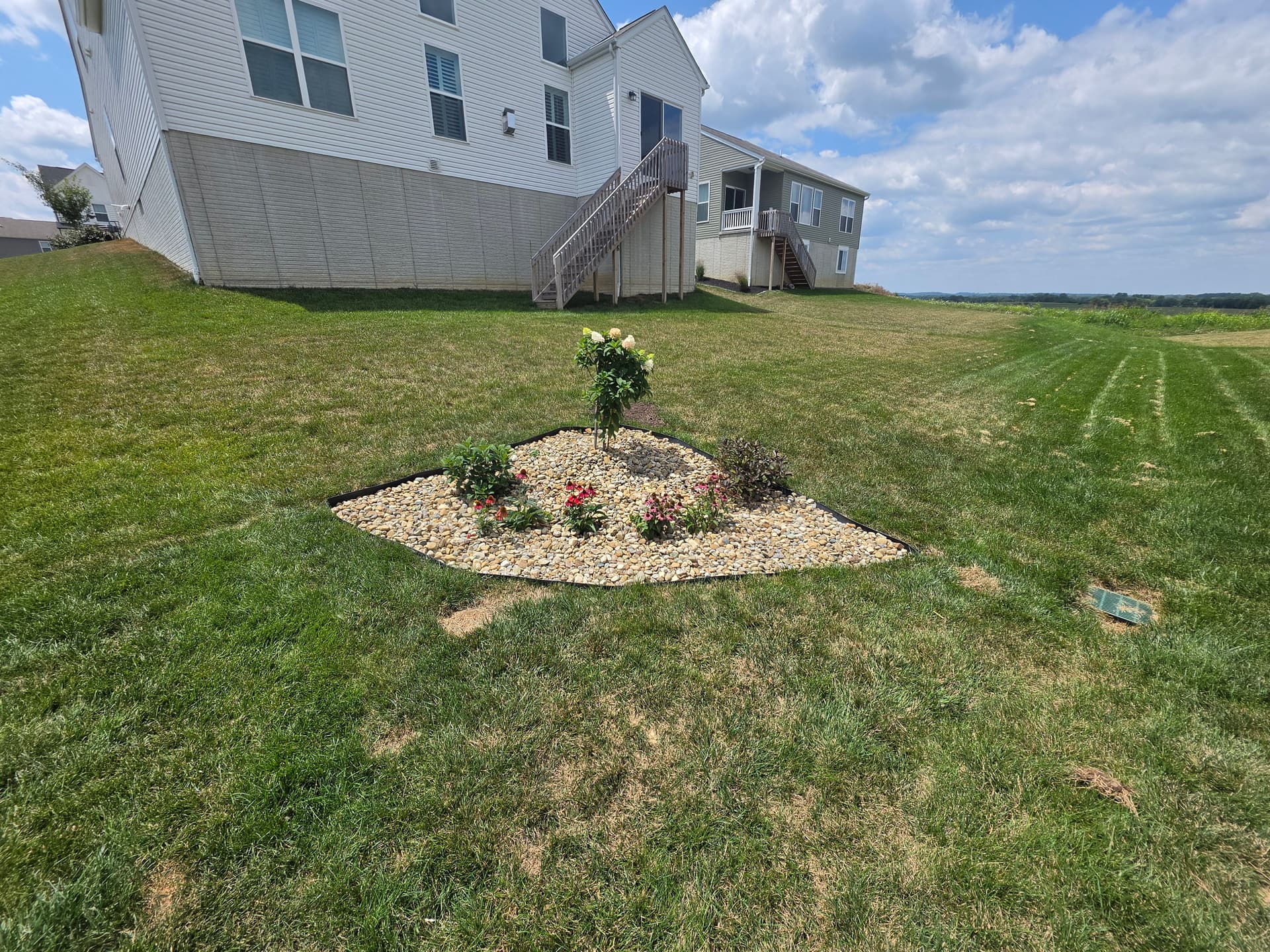 Gallery photos for Custom Patio, River Rock Beds, and Fresh Plantings Done Right: Image #6