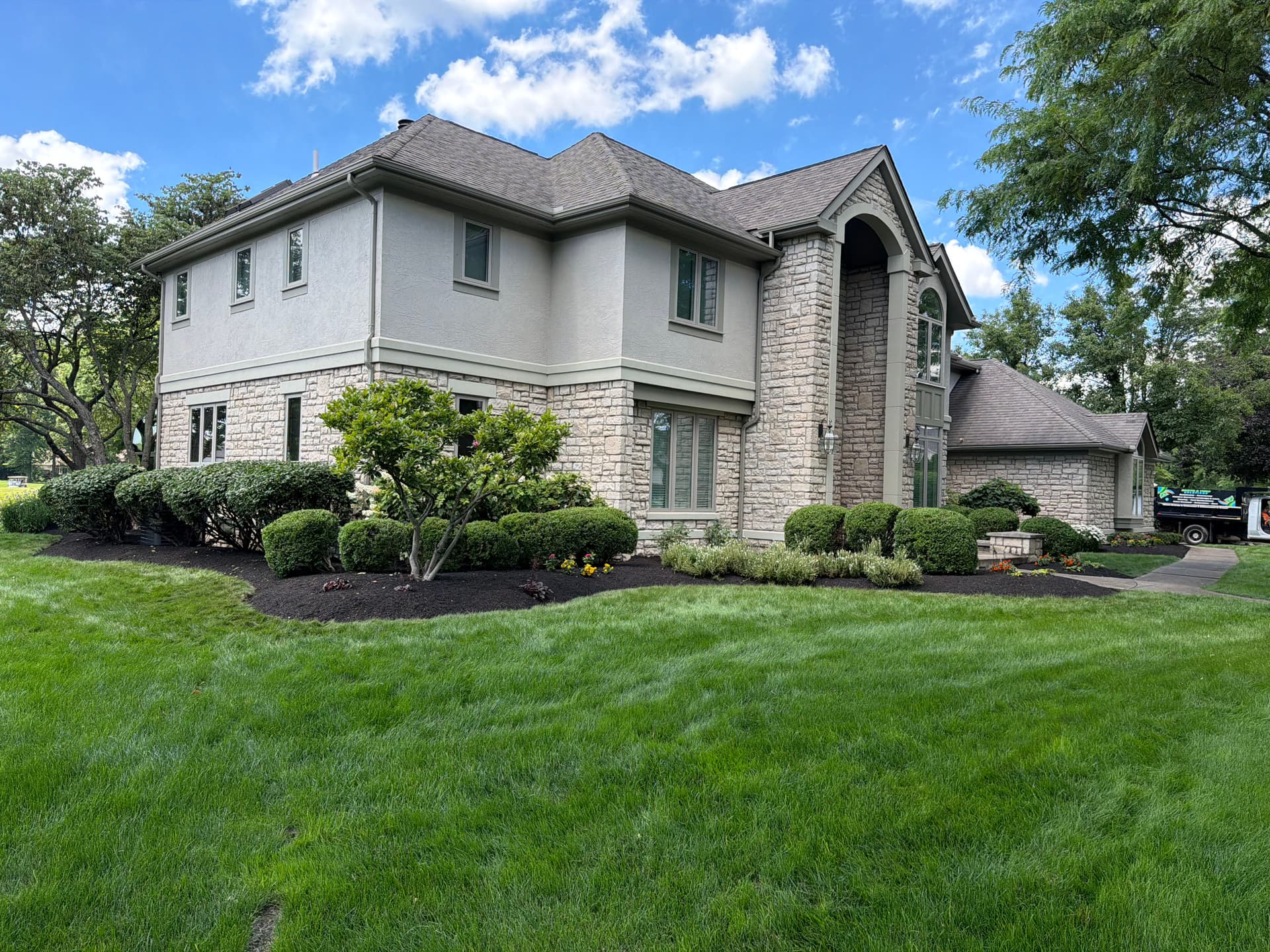 Gallery photos for Bed Cleanup, Shrub Pruning, and Black Mulch Install in Blacklick Ohio: Image #1