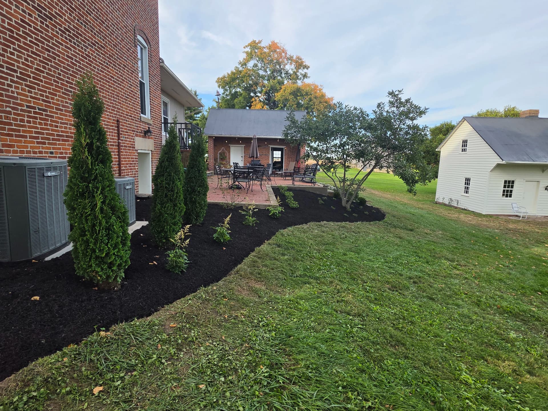 Full Landscape Redesign for a Classic Brick Farmhouse image