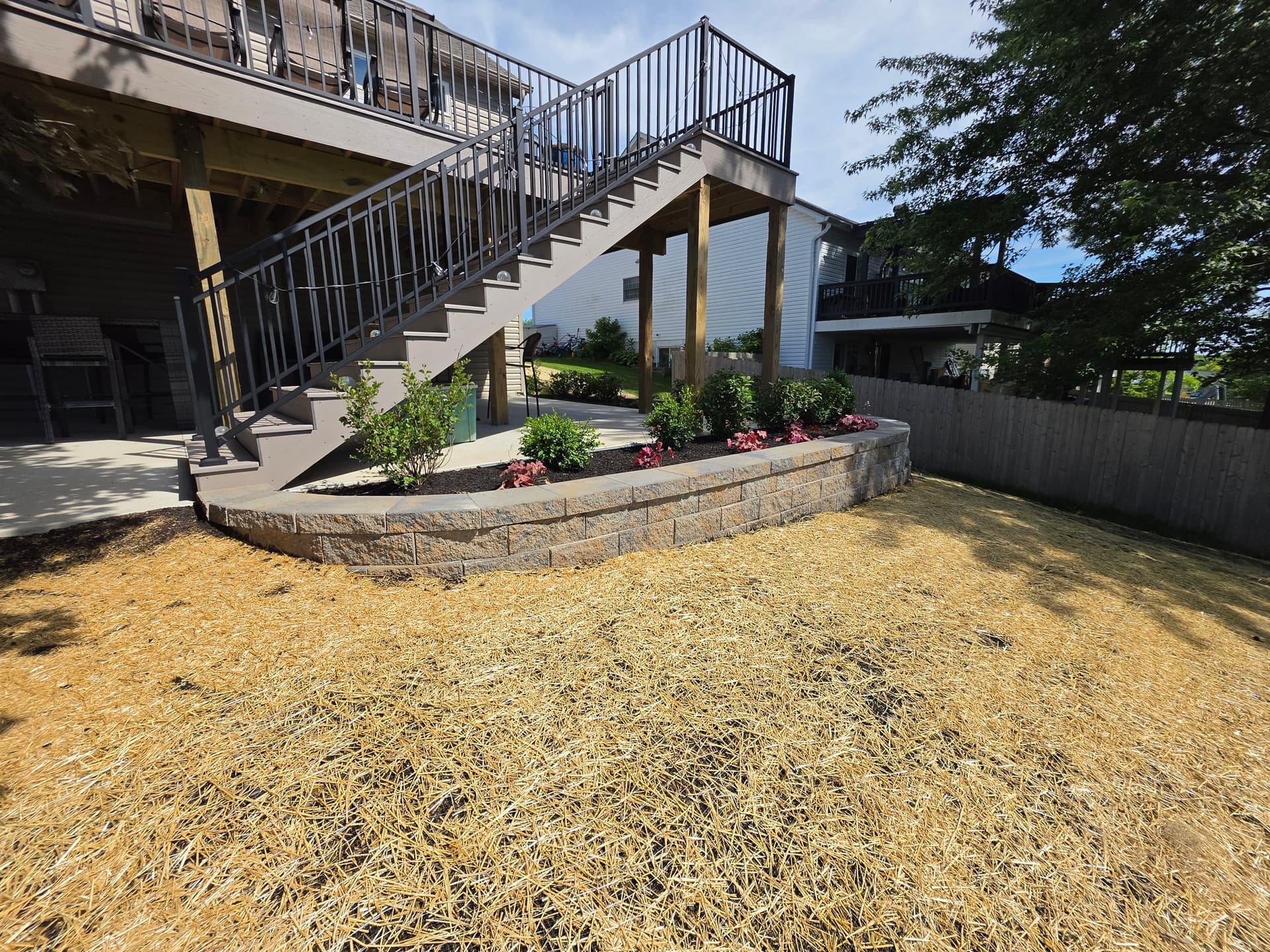Retaining Wall, Planting Bed and Full Yard Restoration Completed