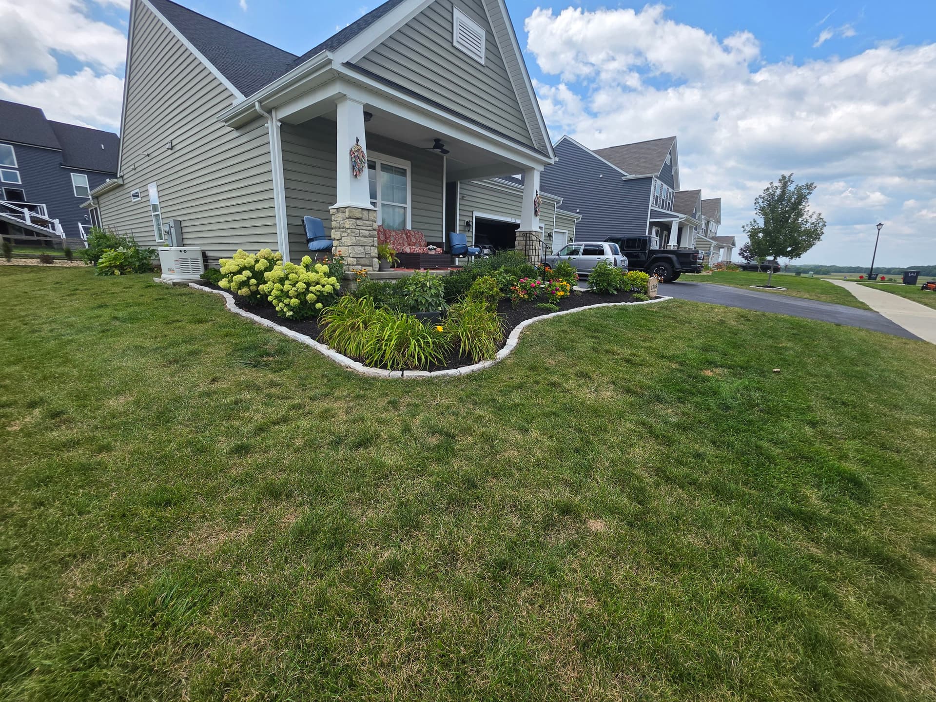 Gallery photos for Custom Patio, River Rock Beds, and Fresh Plantings Done Right: Image #3