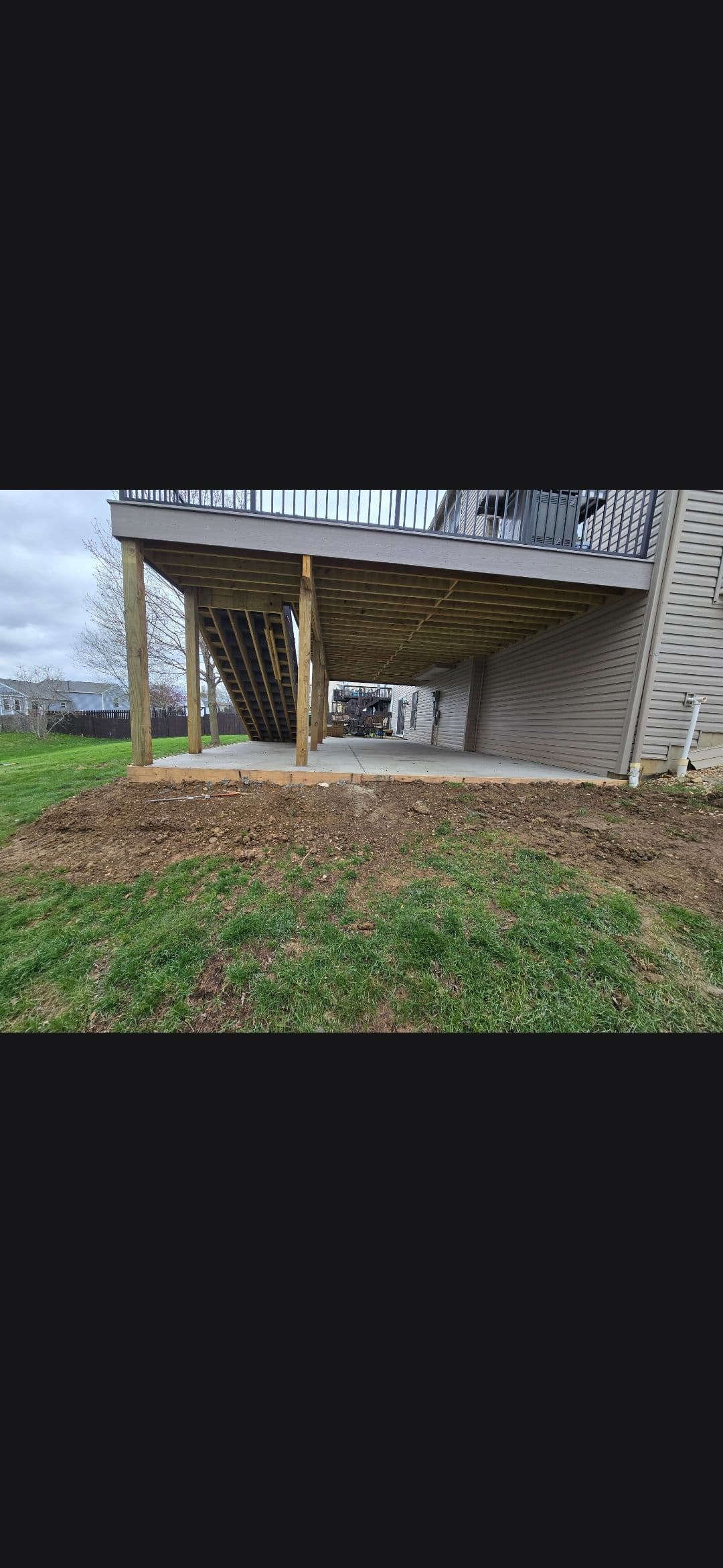 Retaining Wall, Planting Bed and Full Yard Restoration Completed