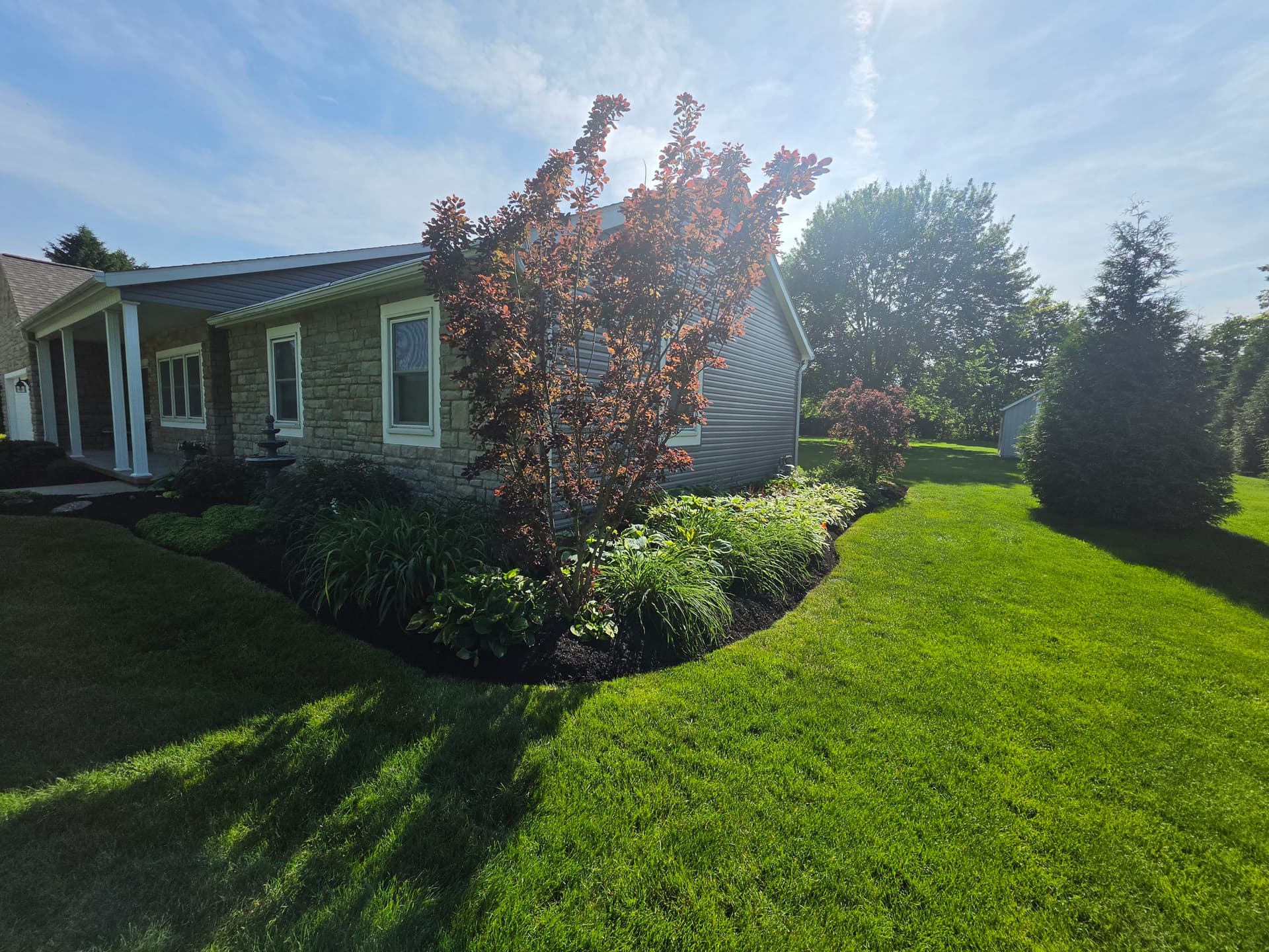 Gallery photos for Fresh Mulch and Clean Beds Keep This Landscape Looking Sharp: Image #3